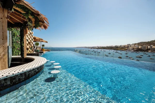 Malta getaway at dreamy resort with INDOOR waterfall 😱